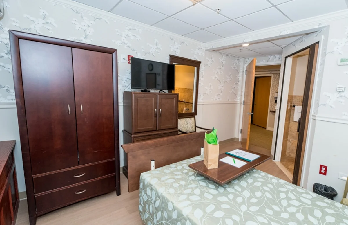 long-term care room armoire and TV